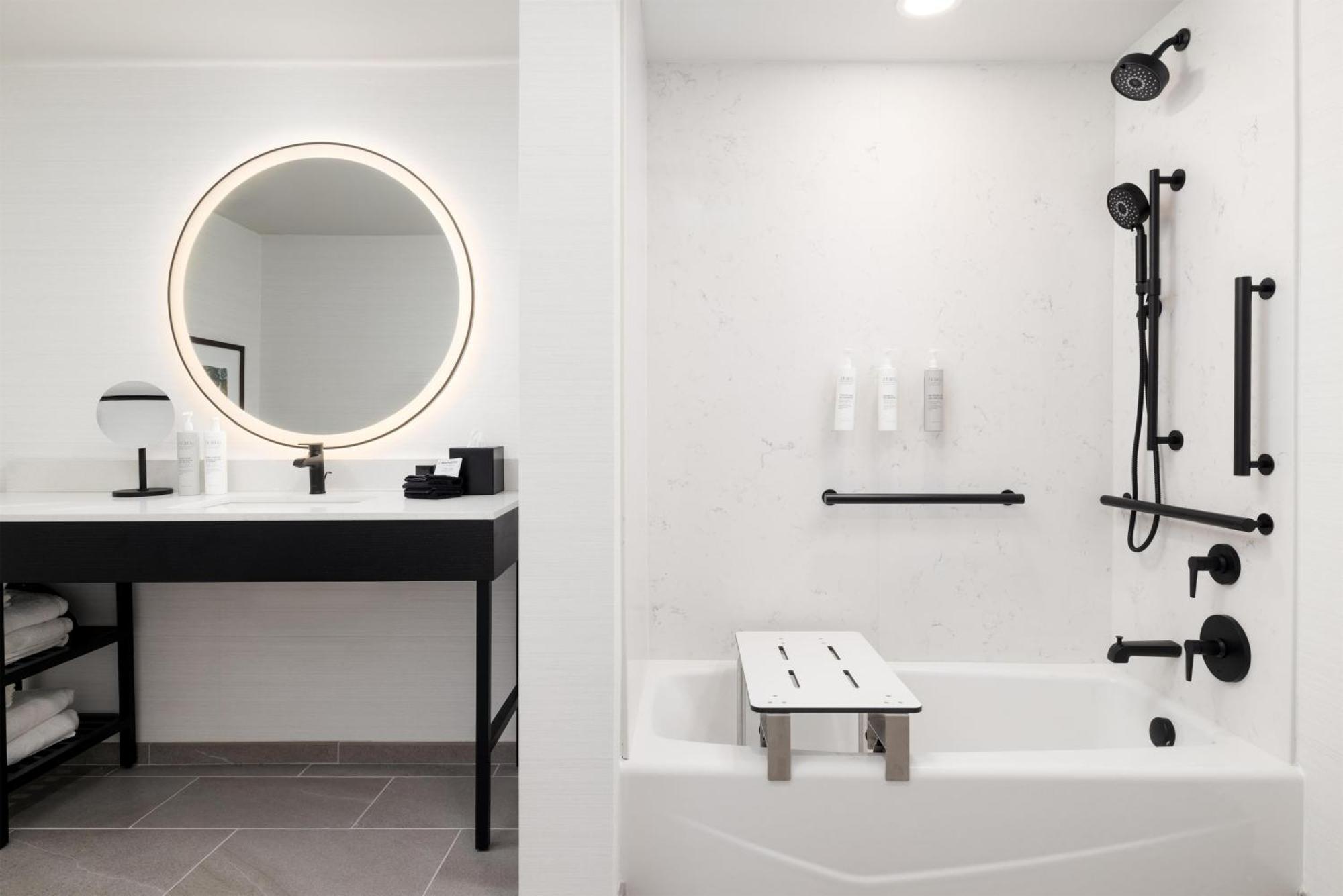 One-Room King Suite Bath Tub Mobility Accessible